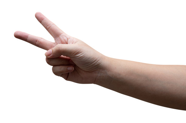 女士的手显示出白色背景上的第二根手指。图片下载