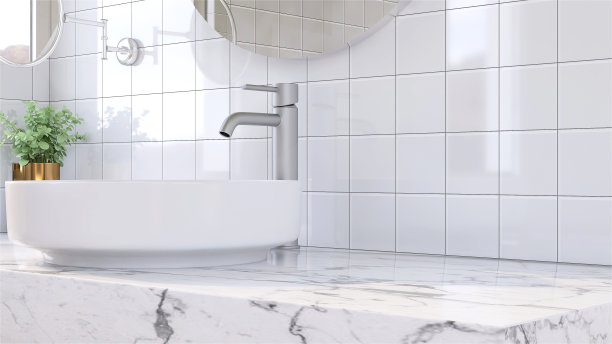 现代简约的浴室梳妆台设计，大理石台面和白色圆形陶瓷脸盆和室内植物从窗户的阳光图片下载