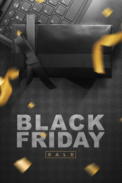 黑色礼品盒与黑色丝带笔记本电脑与黑色星期五销售文本图片下载