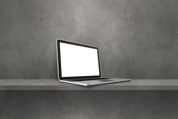 灰色架子背景上的笔记本电脑图片下载