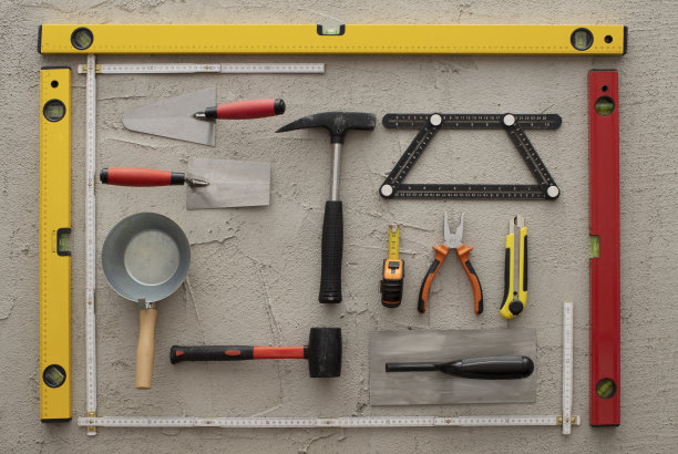 施工工具在混凝土背景上复制空间库存照片图片下载