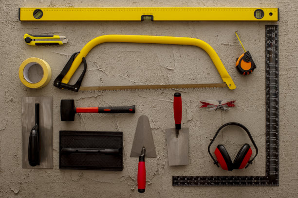 施工工具在混凝土背景上复制空间库存照片图片下载