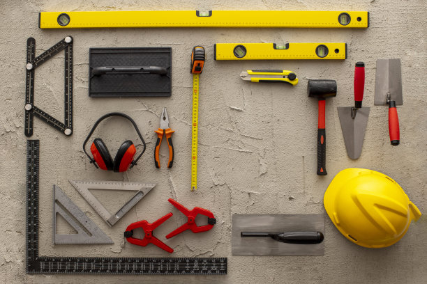 施工工具在混凝土背景上复制空间库存照片图片下载