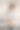 怀孕的成年妇女熨烫新生婴儿的衣服。图片下载