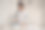 怀孕的成年妇女熨烫新生婴儿的衣服。图片下载