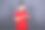 一个年轻快乐的亚洲人使用手机的肖像图片下载