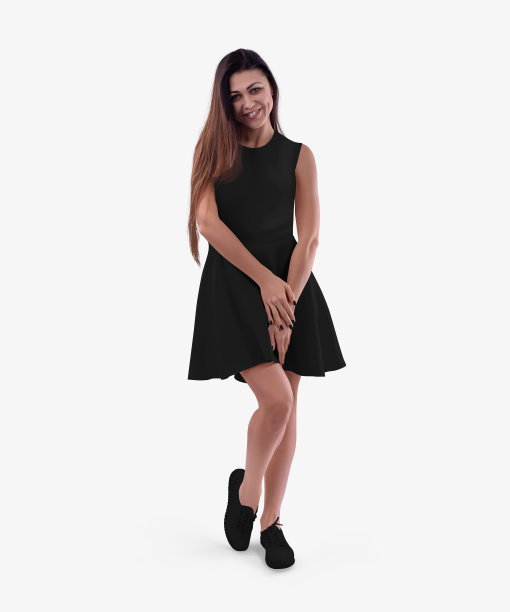 一个黑头发女孩穿鞋的黑色波浪裙的模型，一个夏天的太阳裙与蓬松的裙子，孤立的背景，前视图。图片下载