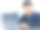 男员工用笔记本电脑工作，看着相机微笑图片下载