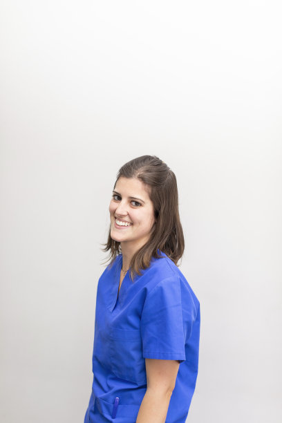 一位女牙医，在牙科诊所微笑图片下载