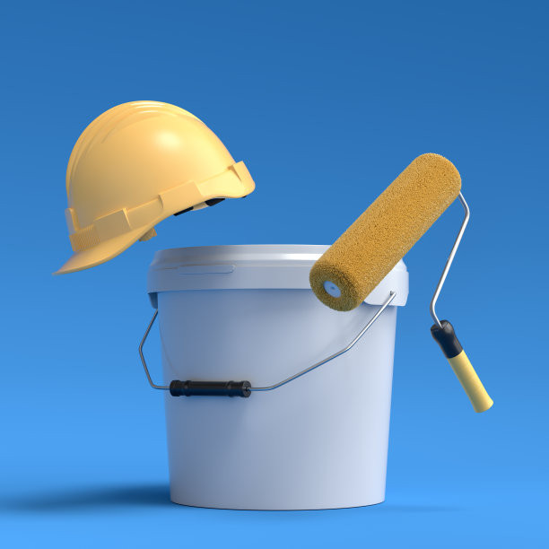 一套安全头盔，桶与油漆辊和刷子蓝色背景。图片下载