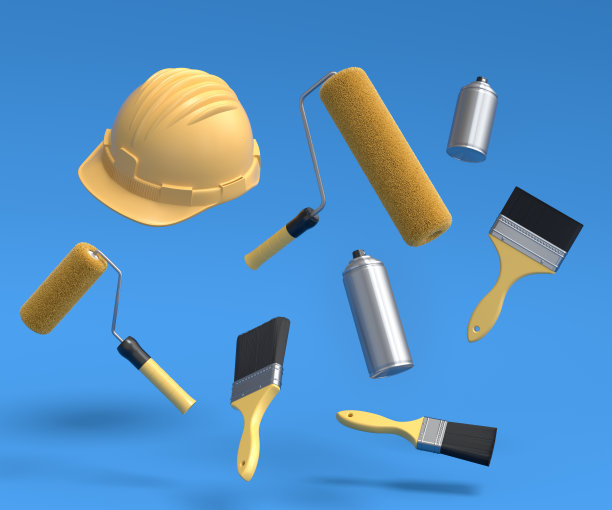 一套飞行安全帽，用油漆辊和刷子喷在蓝色上。图片下载