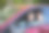 亚洲年轻女子坐在车里，把手伸出窗外，挥手图片下载