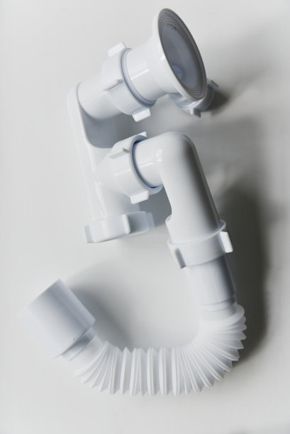 白色的塑料浴缸虹吸在白色的背景。水管单位。图片下载