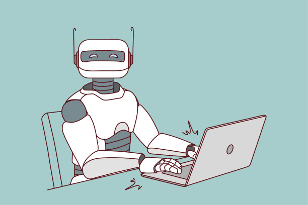 机器人在桌上的笔记本电脑上工作图片下载