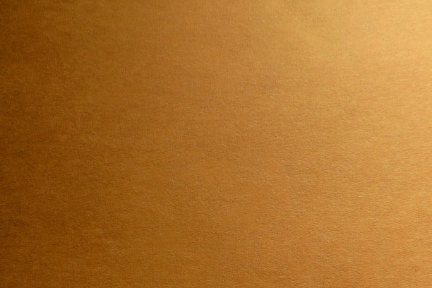 纸纹理背景。这张纸的颜色是橙色的。文本的地方图片下载