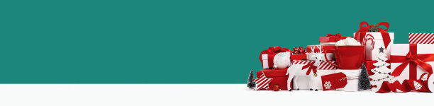 一套红色和白色的礼盒在绿色的背景图片下载