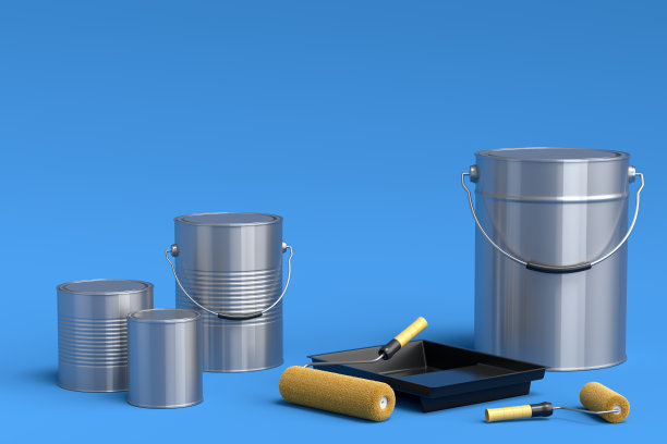 一套金属罐或桶与油漆辊和托盘在蓝色背景。图片下载