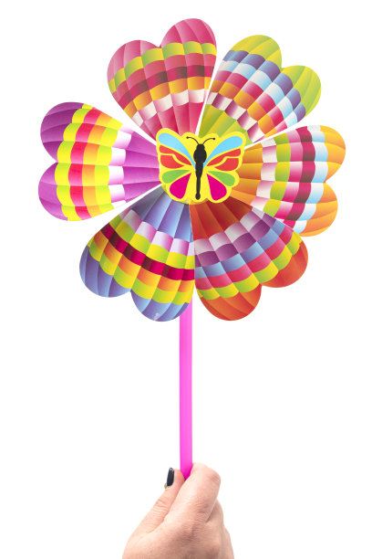 彩色玩具风力涡轮机孤立在白色背景。高质量的照片图片下载