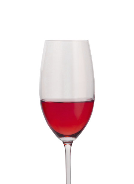 红酒装在孤立的玻璃杯里图片下载