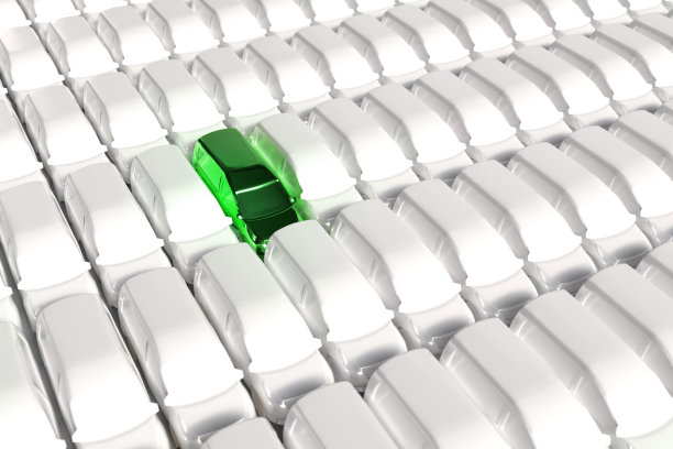 灯光抽象的背景与站立的汽车。其中一辆车被突出显示。模板的主题是生态和不同寻常的汽车脱颖而出图片下载