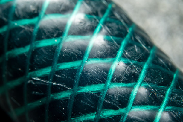 绿色花园软管的微距照片。图片下载