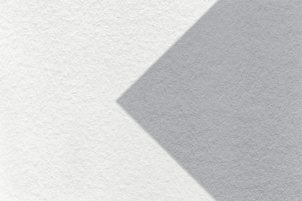 纹理为白纸背景，半两色带灰色箭头，微距。工艺灰色纸板结构。图片下载