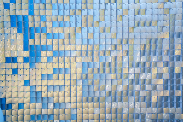 有闪亮亮片的墙。闪光,闪烁。图片下载