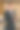 西装革面带微笑的商人站在酒店房间里使用数码平板电脑和看着相机图片下载