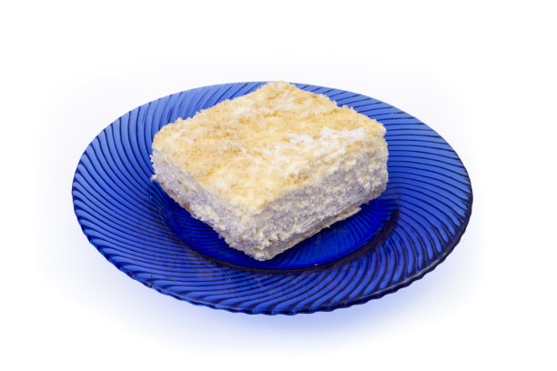 在白色玻璃板上隔离的蓝色玻璃方块部分图片下载