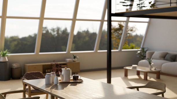 简约的当代公寓客厅内饰，简约的木质餐桌和家居装饰图片下载