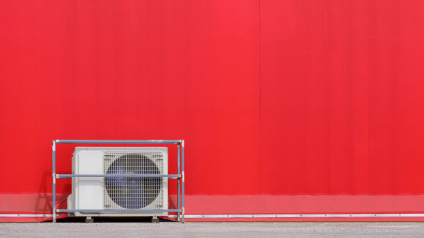 红色活动帐篷外地板上空调压缩机的外部建筑背景图片下载