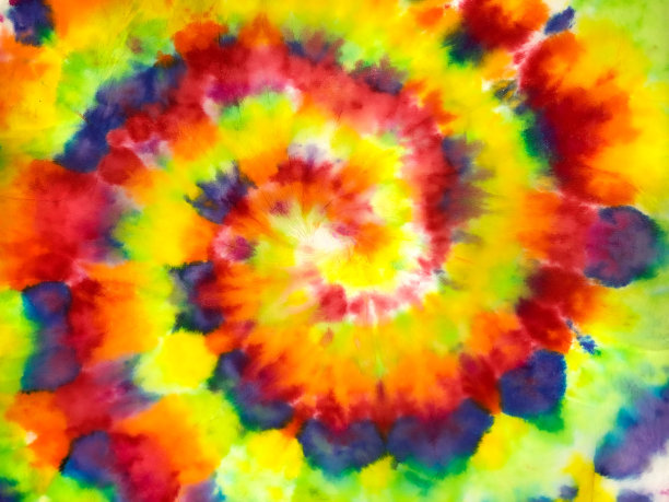 彩色图形螺旋扎染。染色亮扎染染色风格。螺旋扎染服装纺织品。美丽明亮的螺旋扎染艺术品绘画。图片下载