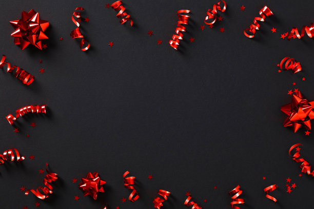黑色背景上的红色派对横幅和五彩纸屑。黑色星期五销售横幅模板。图片下载