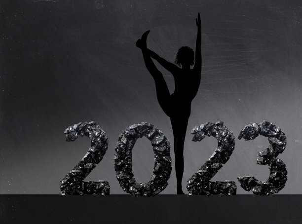 2023年新年快乐，女性练习瑜伽的剪影图片下载