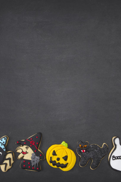 黑色背景万圣节饼干图片下载