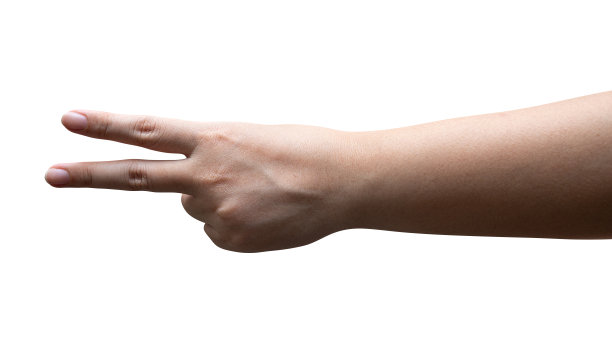 女士的手显示出白色背景上的第二根手指。图片下载