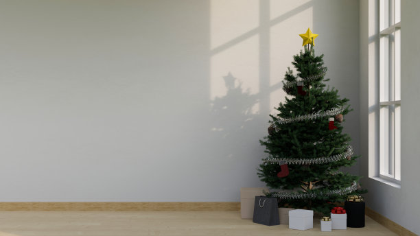 在圣诞节期间，最小的客厅有圣诞树，木地板上的装饰品图片下载