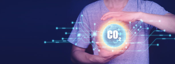 减少二氧化碳排放的概念在手中为环境，全球变暖，可持续发展和绿色企业基于可再生能源。图片下载