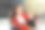 年轻的母亲抱着儿子，儿子躺在她的腿上。户外的照片图片下载