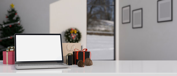 工作区与笔记本样机，礼品盒和复制空间白色桌面圣诞主题图片下载