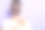 室内拍摄的男子在白色t恤和化妆面具在他的脸上，做抗衰老的程序，指着旁边的蚂蚁复制空间的广告或促销文字。图片下载