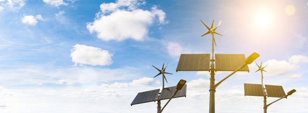 可再生能源旗帜。风力发电机采用太阳能发电板，可再生光伏技术。替代能源的概念。图片下载