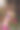 一位美丽的年轻女子穿着连衣裙坐在牡丹花丛的秋千上。太阳眩光图片下载