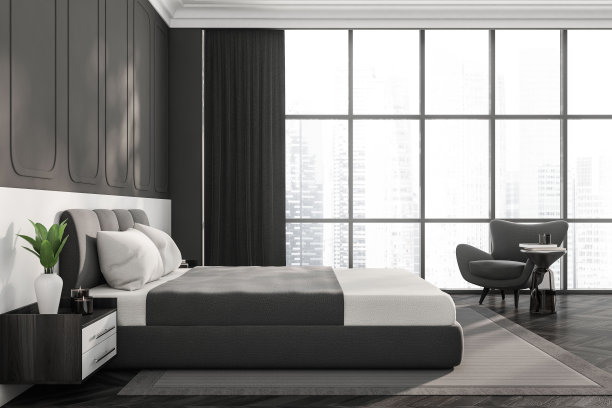 侧视图在黑暗的卧室内部与床，全景窗口图片下载