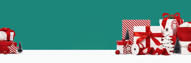 一套红色和白色的礼盒在绿色的背景图片下载