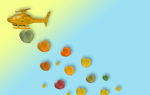 秋天的直升机飞来飞去，五颜六色的秋叶掉出来吧，创意秋的概念图片下载