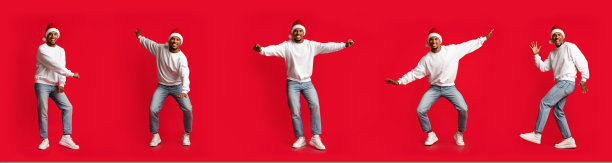 快乐的黑人戴着圣诞帽，在红色的拼贴画上移动图片下载