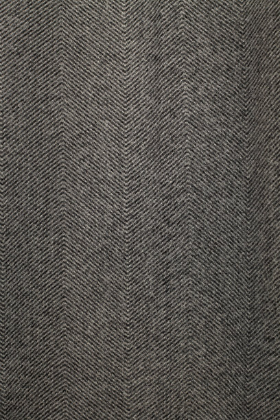 灰色粗花呢织物的质地。无缝的纺织品。图片下载