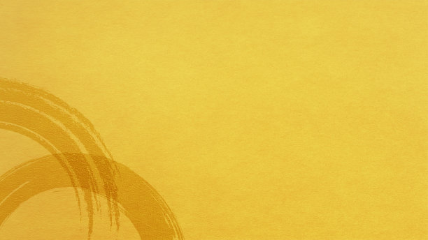 背景材料适合新年贺卡和元旦。两个用金毛笔写的圆圈。金色背景与粗糙的纹理。图片下载