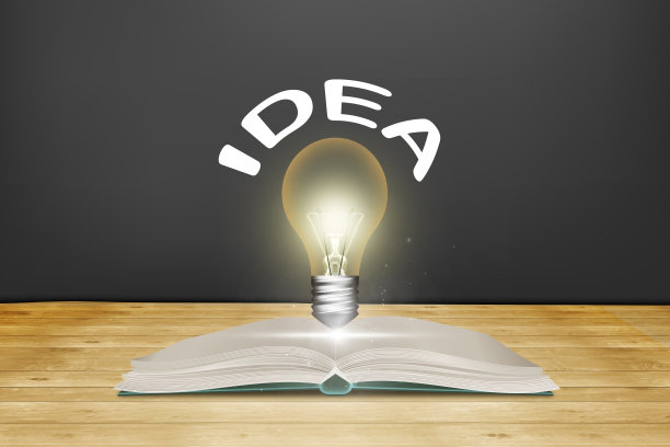 灯泡在书本上发光的概念，从阅读中获得灵感的概念，创新，自学或教育知识的概念，以及商业学习。图片下载